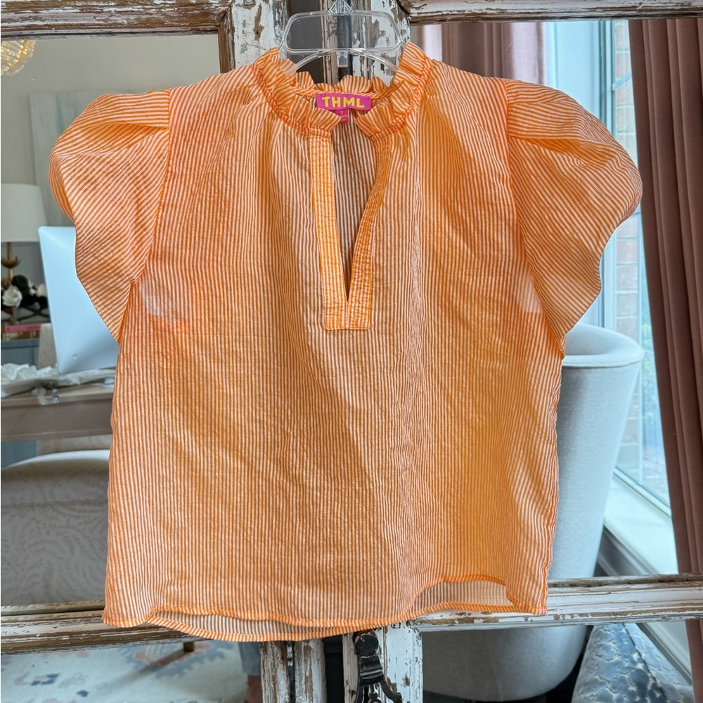 THML orange top